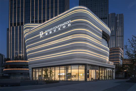 “流线”立面、“白玉”造型、“石窟”灵感……这座艺术馆如何凝聚建筑之美?